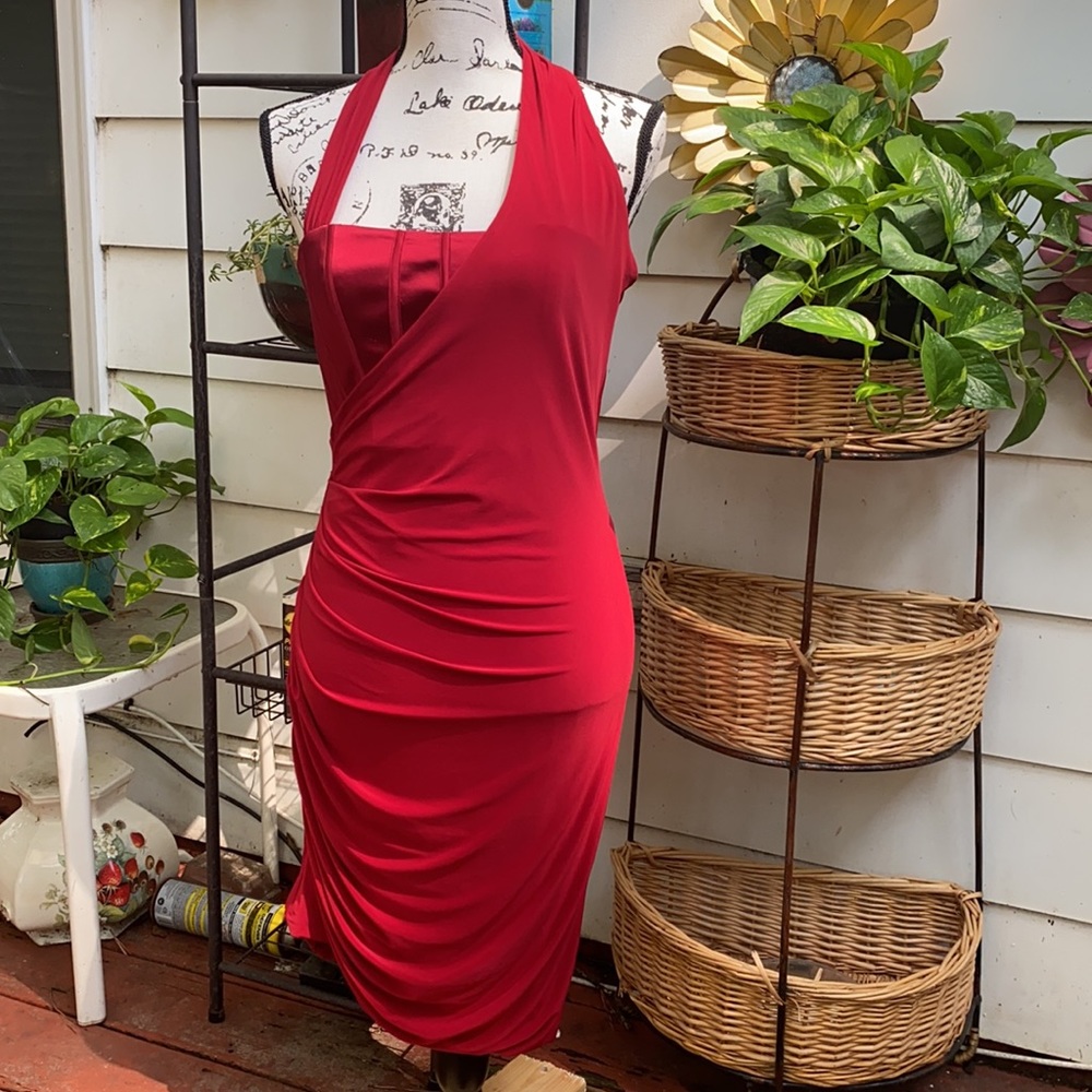 Sassy little holiday dress by BeBe